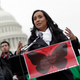 Erika Andiola speaking at a press conference held by the Dream Action Coalition on immigration reform December 4, 2013. Image via Getty.